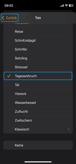 Screenshot von der Tonauswahl für den Wecker beim mit blauer Markierung beim Ton „Tagesanbruch“ und bei der Auswahl „Zurück“